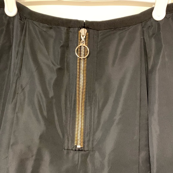 Pink Tartan black a-line skirt w/silver zipper pockets, gold/silver back zipper. - Picture 4 of 5